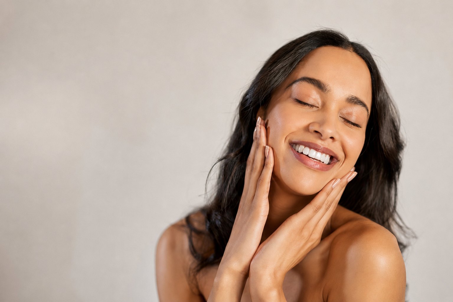 A woman with radiant, healthy, glowing skin